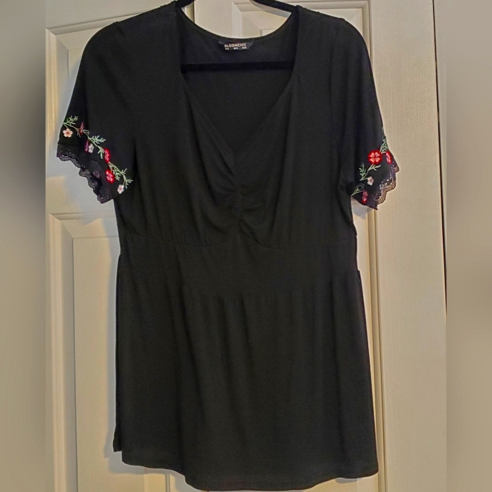 Black tee with lacy floral sleeve